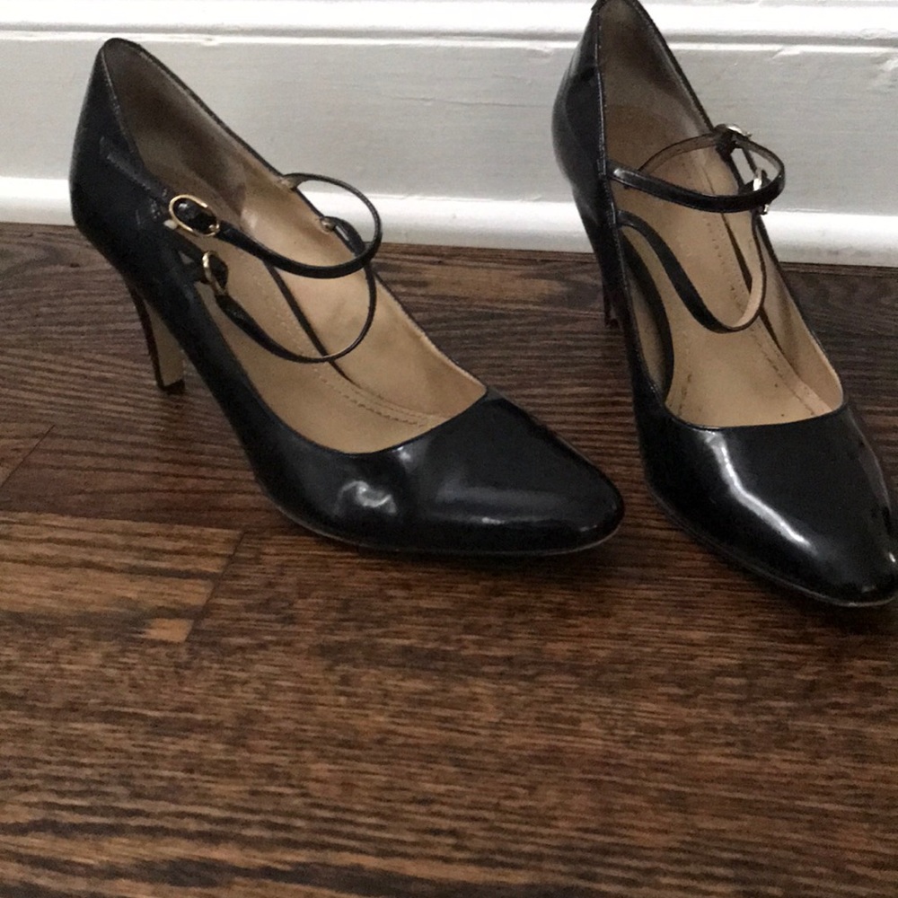 Black patent heels with straps across